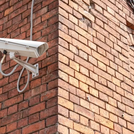 closedcircuit-television-camera-mounted-brick-wall-cctv-security-camera-outdoors