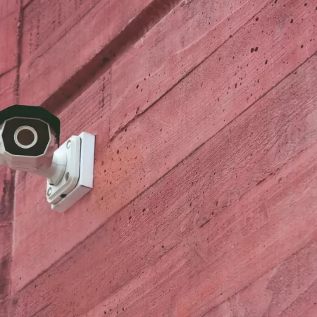 modern-security-ir-cctv-camera-red-brick-wall-building-monitor-events-city-concept-technology-survei